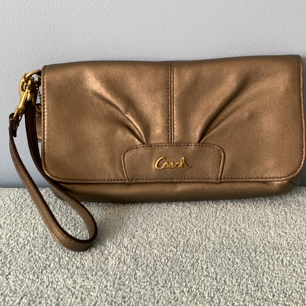 Coach Gold Wristlet bag EUC